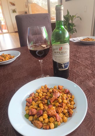 Con unos garbanzos con pernil y panceta