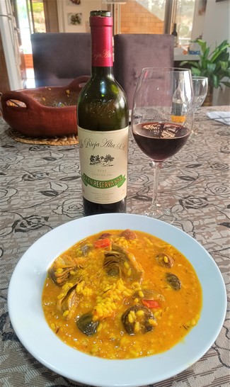 Con el meloso de manitas, morcilla y alcachofas