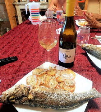 Con la Lubina al horno y sus patatitas