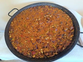 El arroz de pato, costilla, setas y caracoles