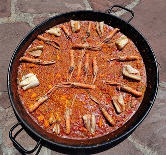 El arroz de cigalas, sepia y gallineta a leñ