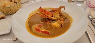 Contenido de un plato de caldereta de langosta ( X 2 cada uno)