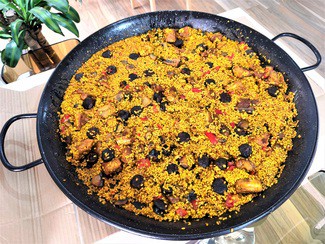 Arrocito a leña de costilla, morcilla y portobellos