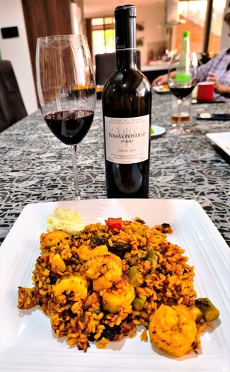 Con un arrocito seco de chipirones y camarones