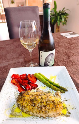 Con una corvina en masala con pimientos y trigueros