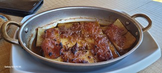 Cazuelita individual de patatas al horno.